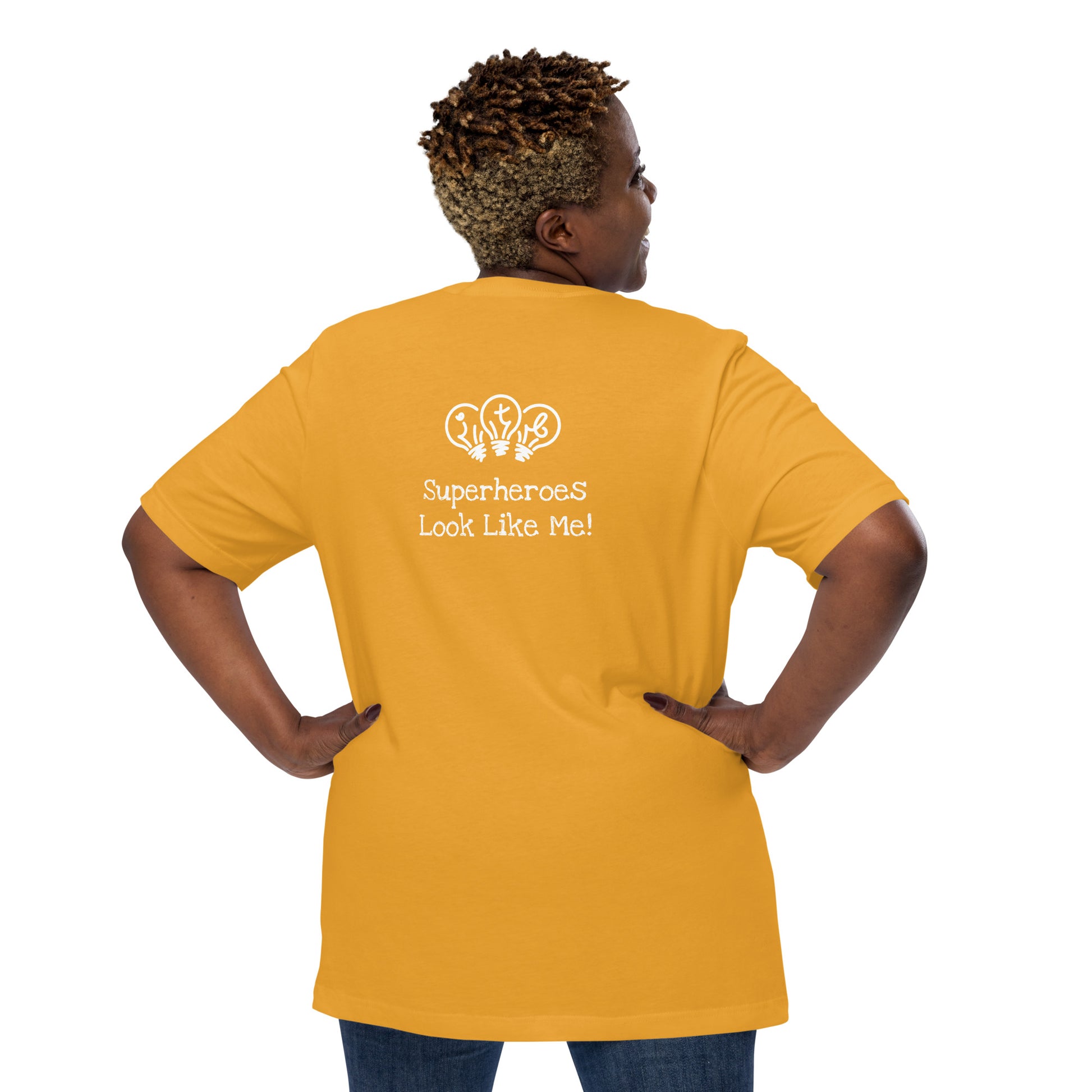 Mustard adult unisex t-shirt with an image of the main character from Crystel Patterson's "Superheroes Here and There" wearing a cape (front) and the text "Superheroes Look Like Me" (back).
