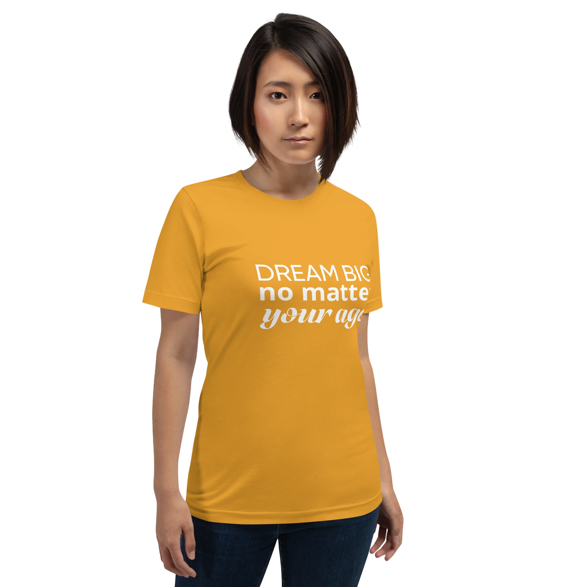 Mustard adult unisex t-shirt showcasing the message "Dream Big No Matter Your Age".