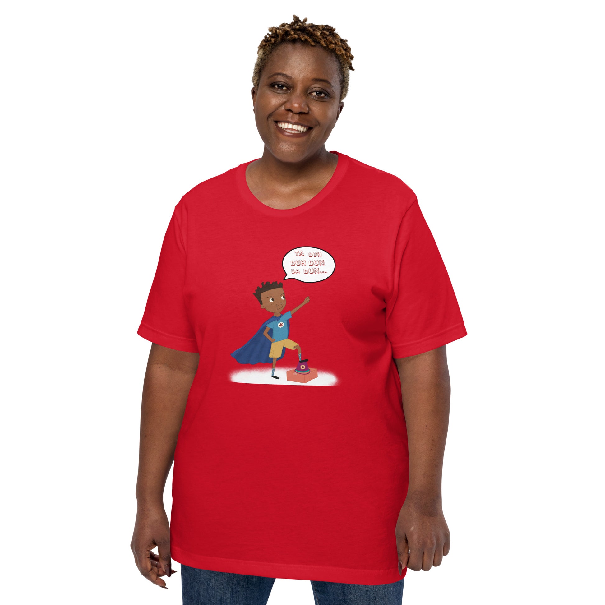 Red adult unisex t-shirt with an image of the main character from Crystel Patterson's "Superheroes Here and There" wearing a cape (front) and the text "Superheroes Look Like Me" (back).