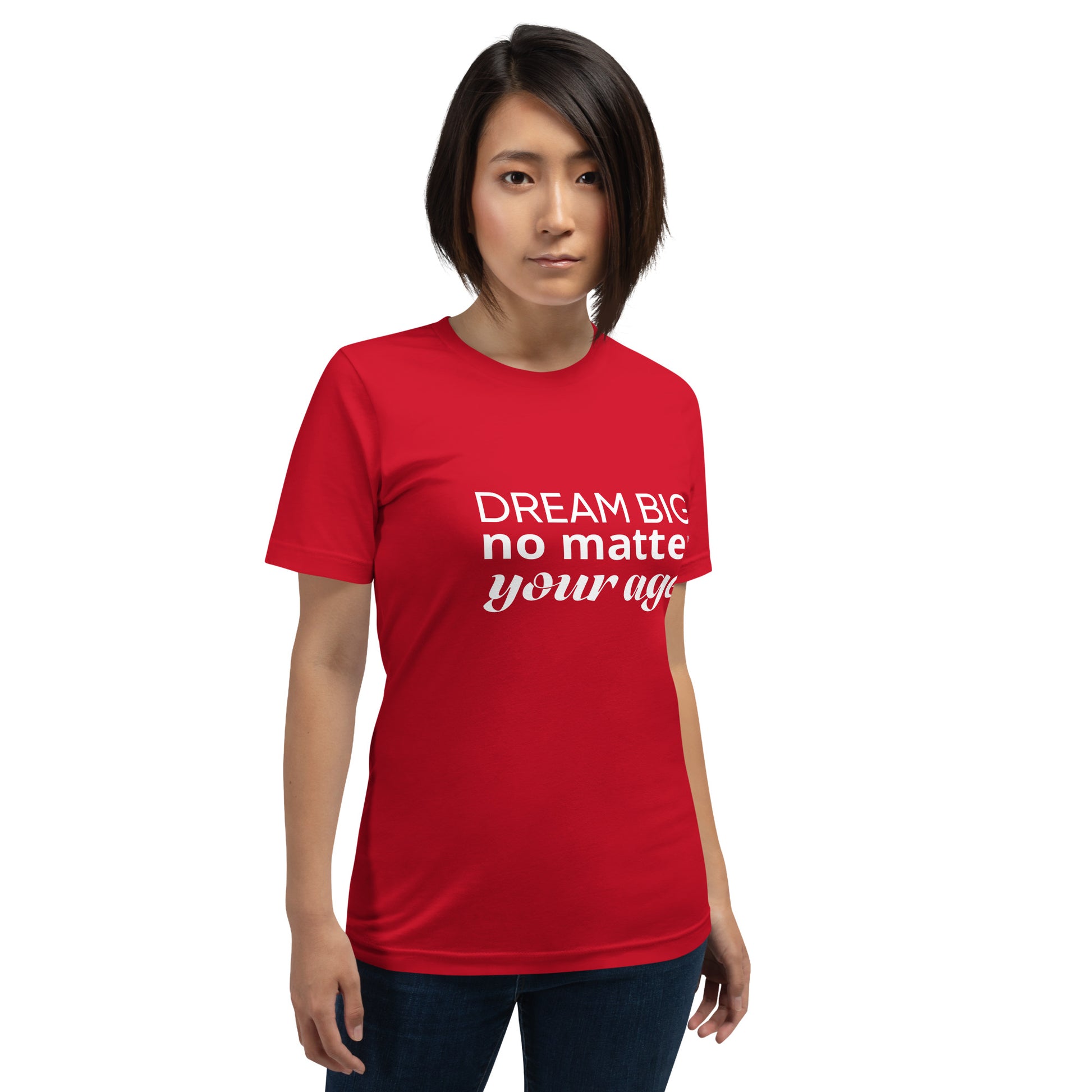 Red adult unisex t-shirt showcasing the message "Dream Big No Matter Your Age".