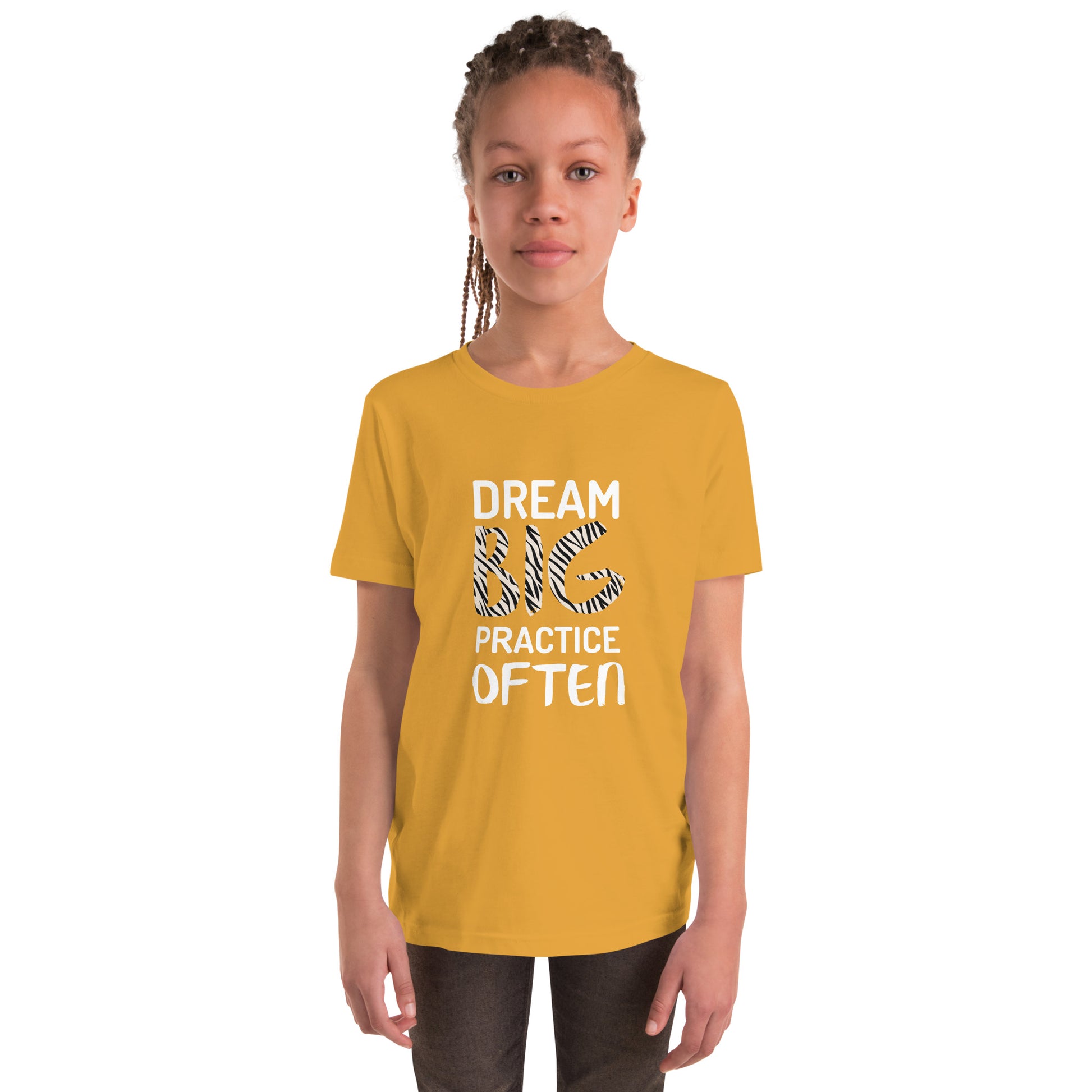 Mustard youth t-shirt featuring the phrase "Dream Big, Practice Often".