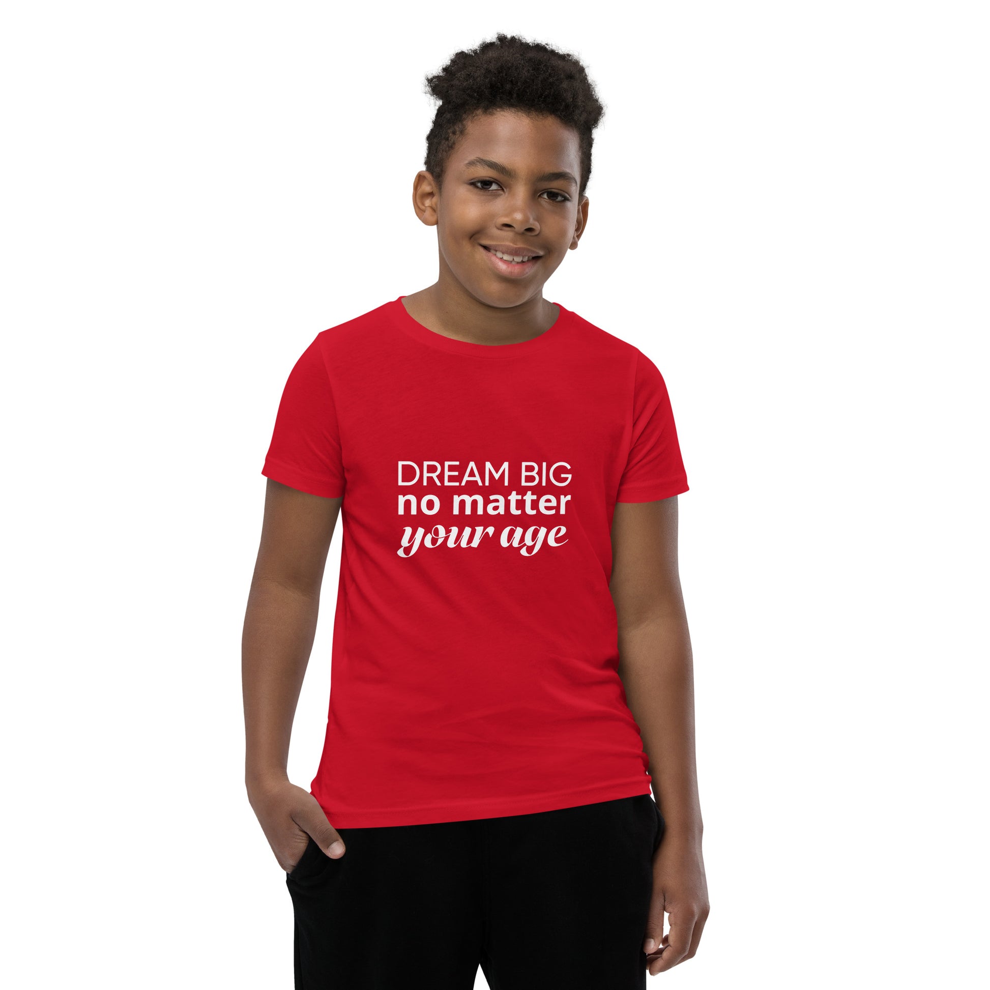 Red youth t-shirt showcasing the message "Dream Big No Matter Your Age".