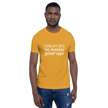 Mustard adult unisex t-shirt showcasing the message "Dream Big No Matter Your Age". 